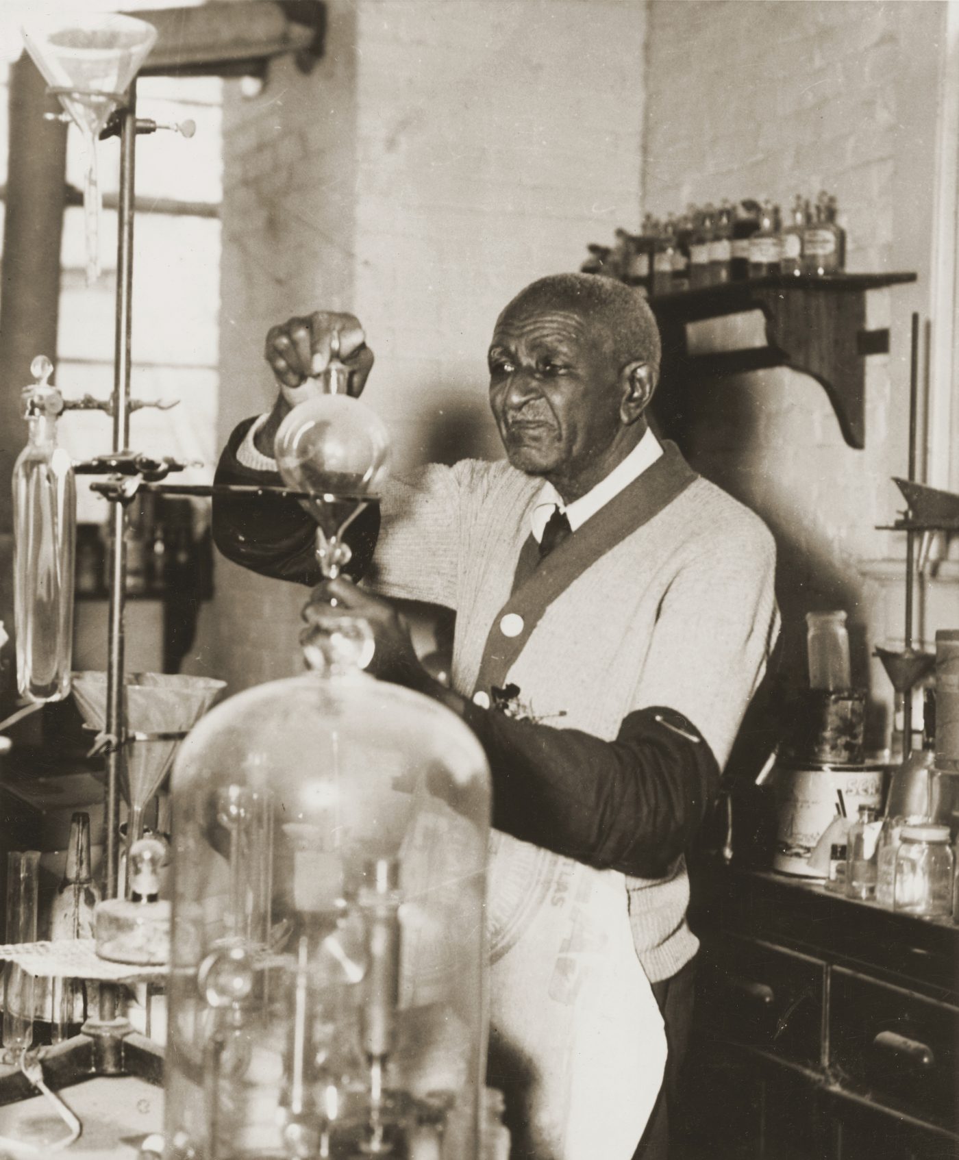 George Washington Carver in his lab