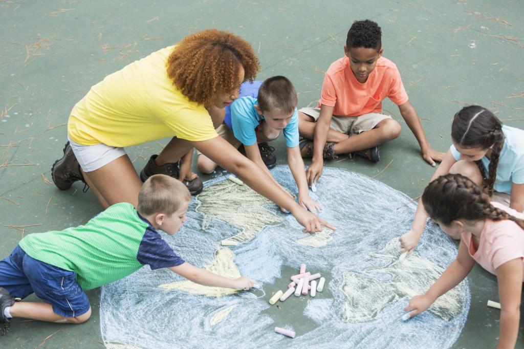 An educator helping young kids make a chalk drawing of the earth