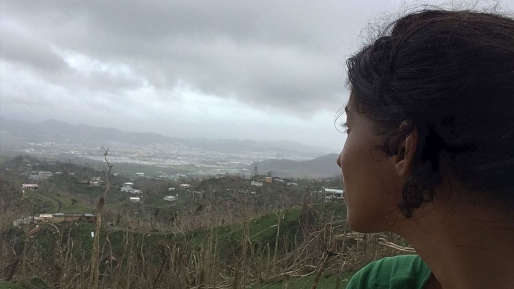Christine Nieves looks out over land post-Hurricane Maria