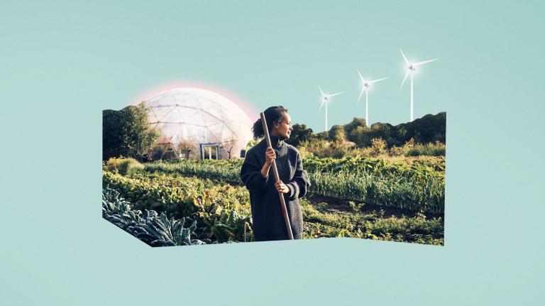 Farmer with glowing greenhouse and wind turbines in background