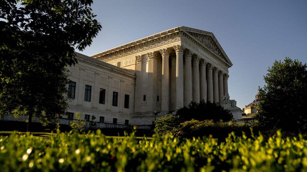 View of Supreme Court with grass in foreground