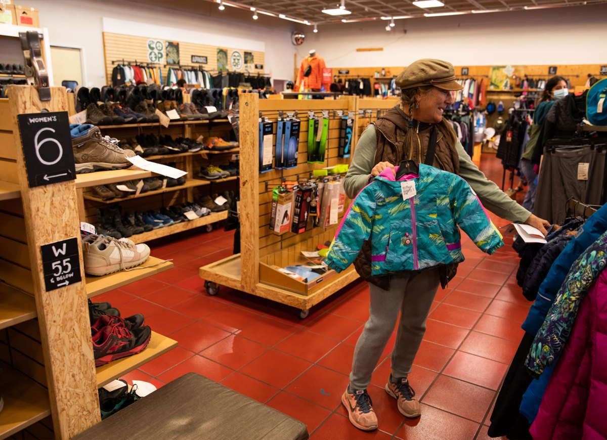 Theresa Berg shops for winter clothes for her grandchildren at the REI Re/Supply store in Manhattan Beach, California.