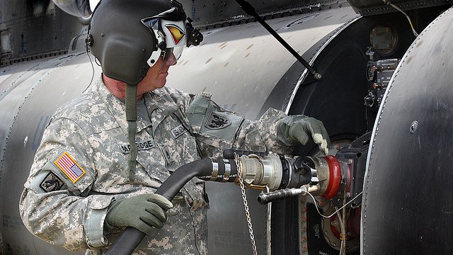 soldier filling tank