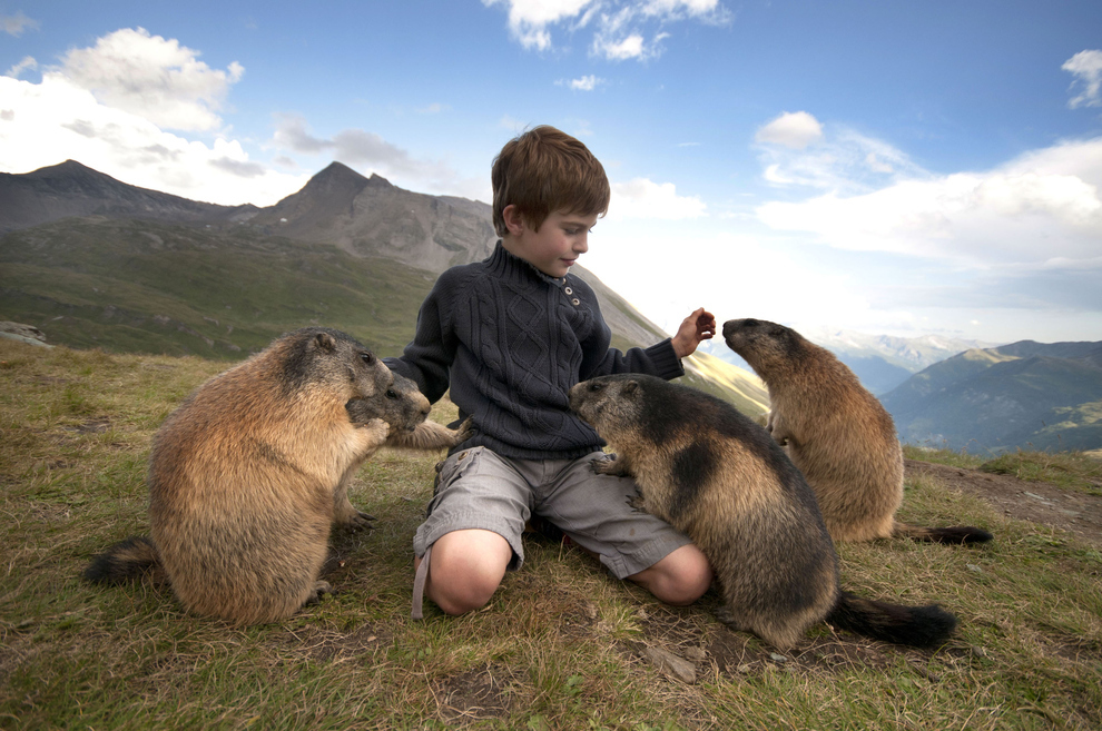 This cute kid is BFFs with a bunch of marmots | Grist