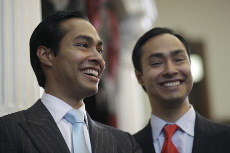 Julian Castro, left, mayor-elect of San Antonio, pauses during a visit with his brother, Rep. Joaquin Castro, D-San Antonio, right, in the Texas House of Representatives Wednesday, May 27, 2009, in Austin, Texas.