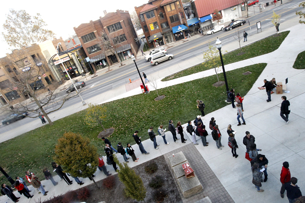 Voters wait in line outside the Ohio Union to cast their ballots during the U.S. presidential election at The Ohio State University in Columbus, Ohio November 6, 2012.