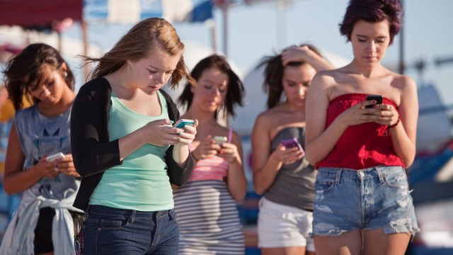young women with smartphones