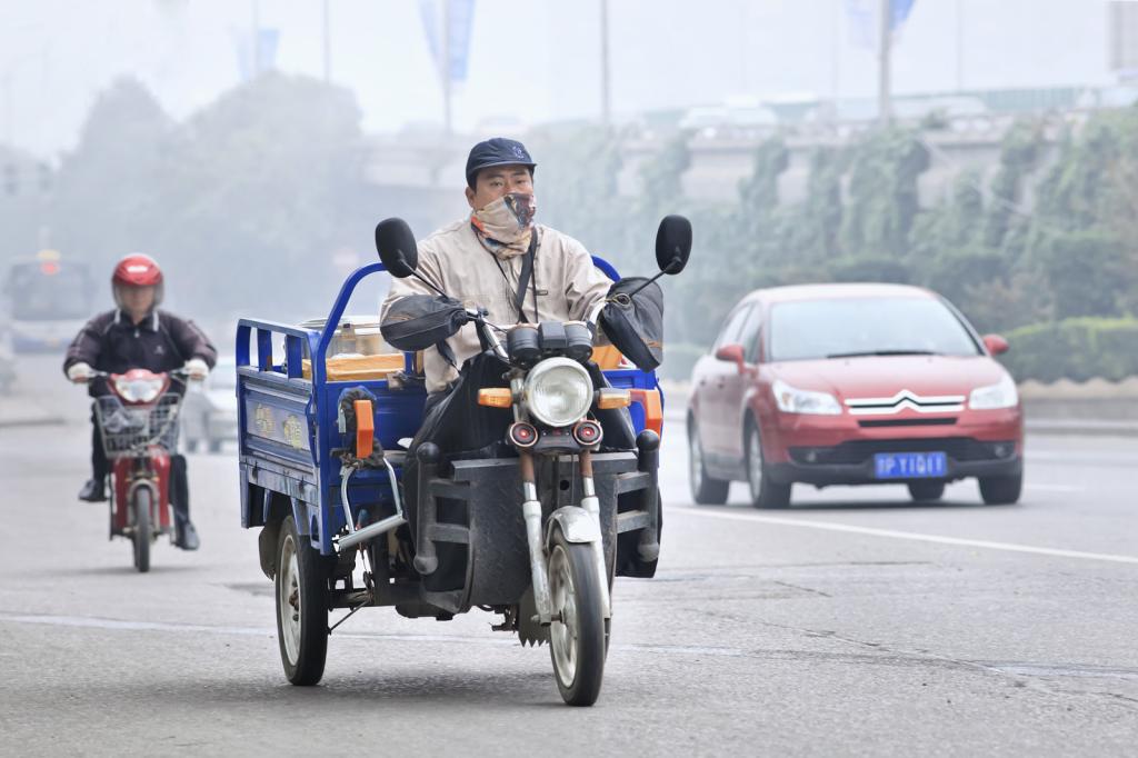 motorcycle driver with mask