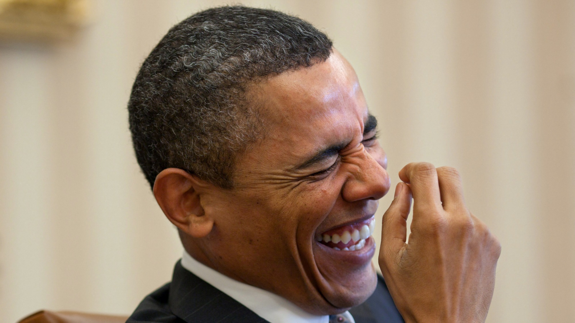 Obama laughs