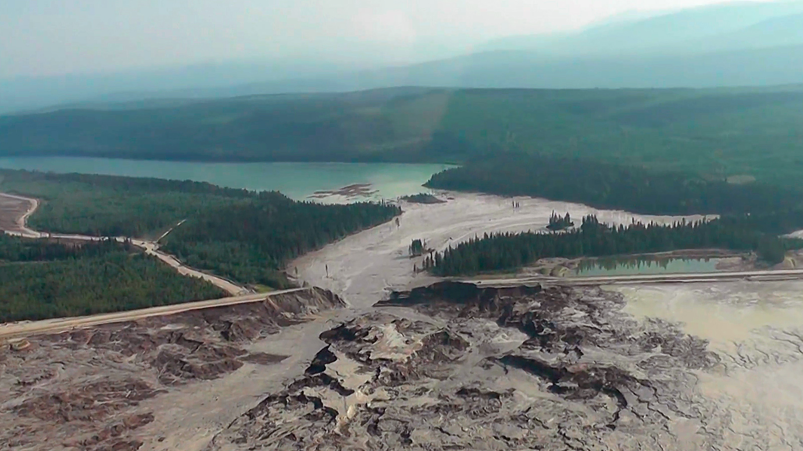 The results of a tailing pond breach at Imperial Metals Corp's gold and copper mine at Mount Polley in central British Columbia are pictured August 4, 2014