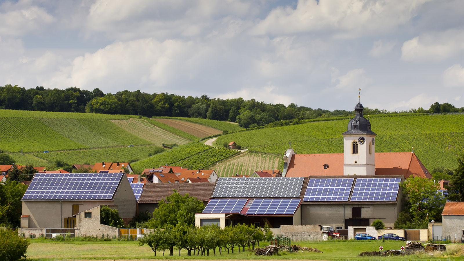 Solar panels installed on roofs in quaint village