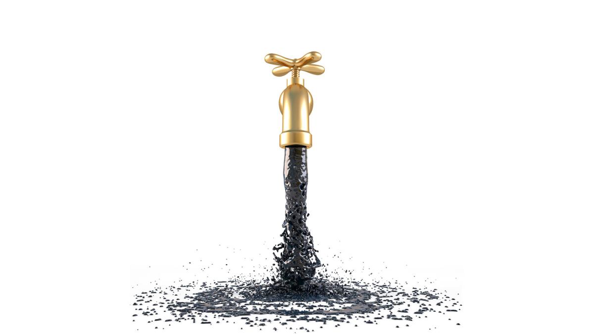 Oil pouring out of faucet.