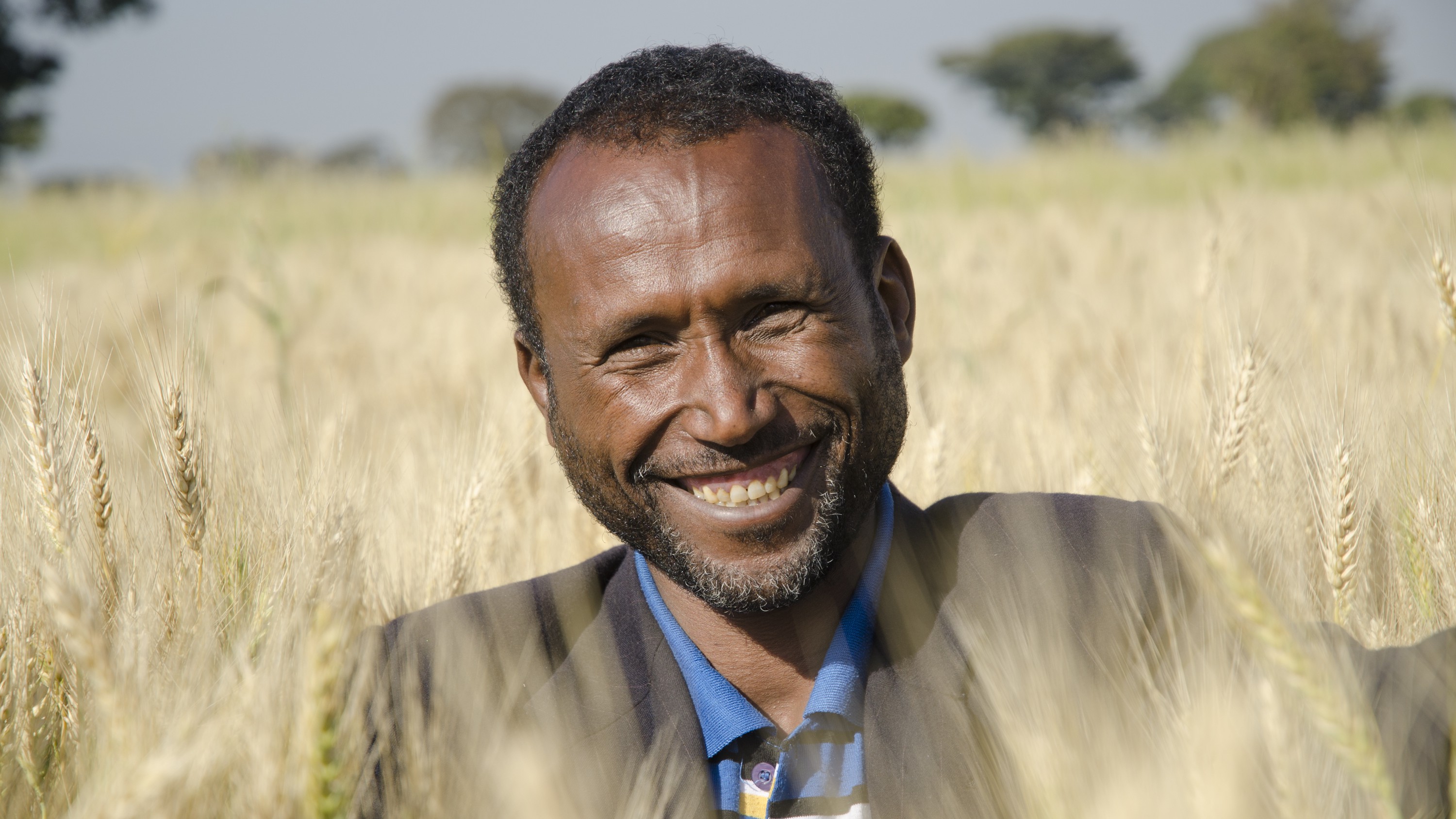 Dadie Buta, 38, in his fields in Karsa Ilela village, Arsi Negele, in the West Arsi zone in Ethiopia.