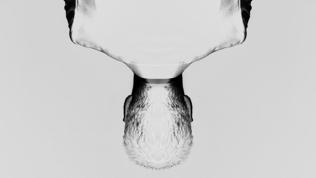 upside-down man with inverted colors