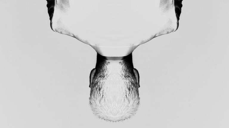 upside-down man with inverted colors