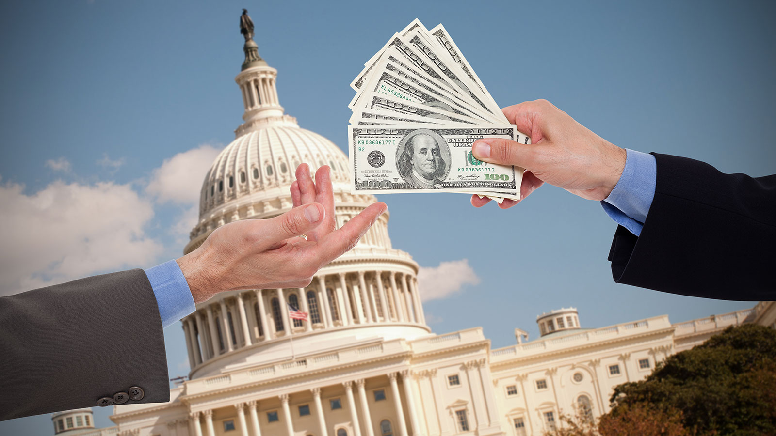 money handoff in front of Capitol
