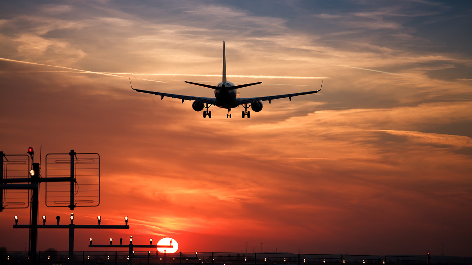 Sunset airplane landing