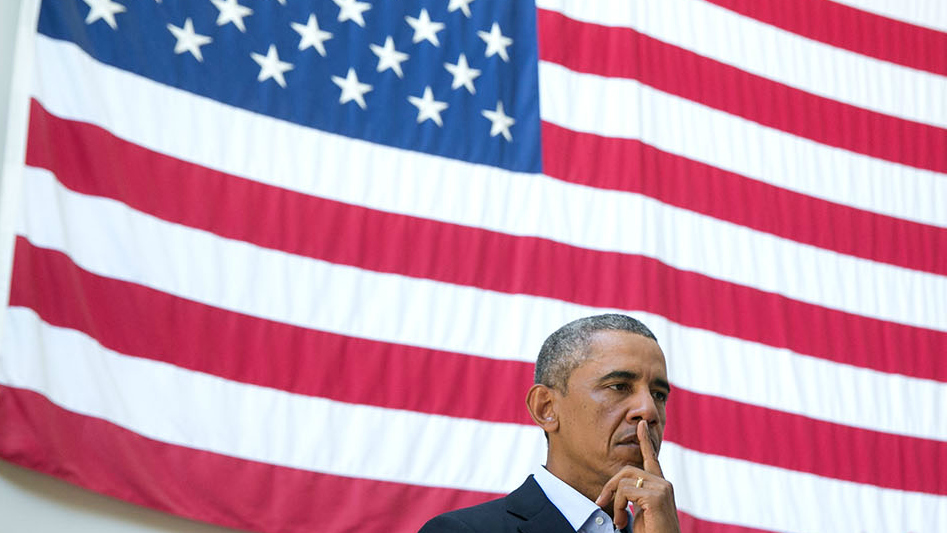 Obama in front of flag