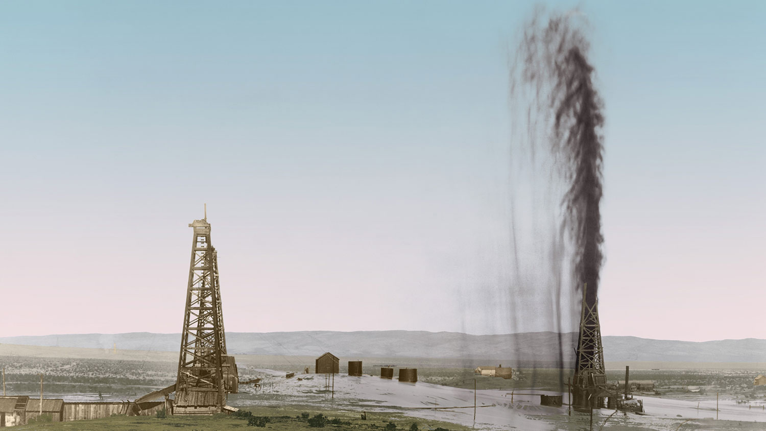 Great gusher in a California oil field floods the surrounding scrub land, 1910