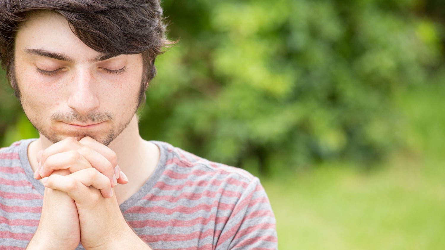 young guy praying