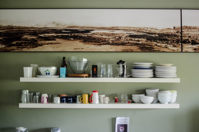In Toppstöðin's shared kitchen, a photograph shows what the landscape of the Elliðaárdalur valley used to look like.