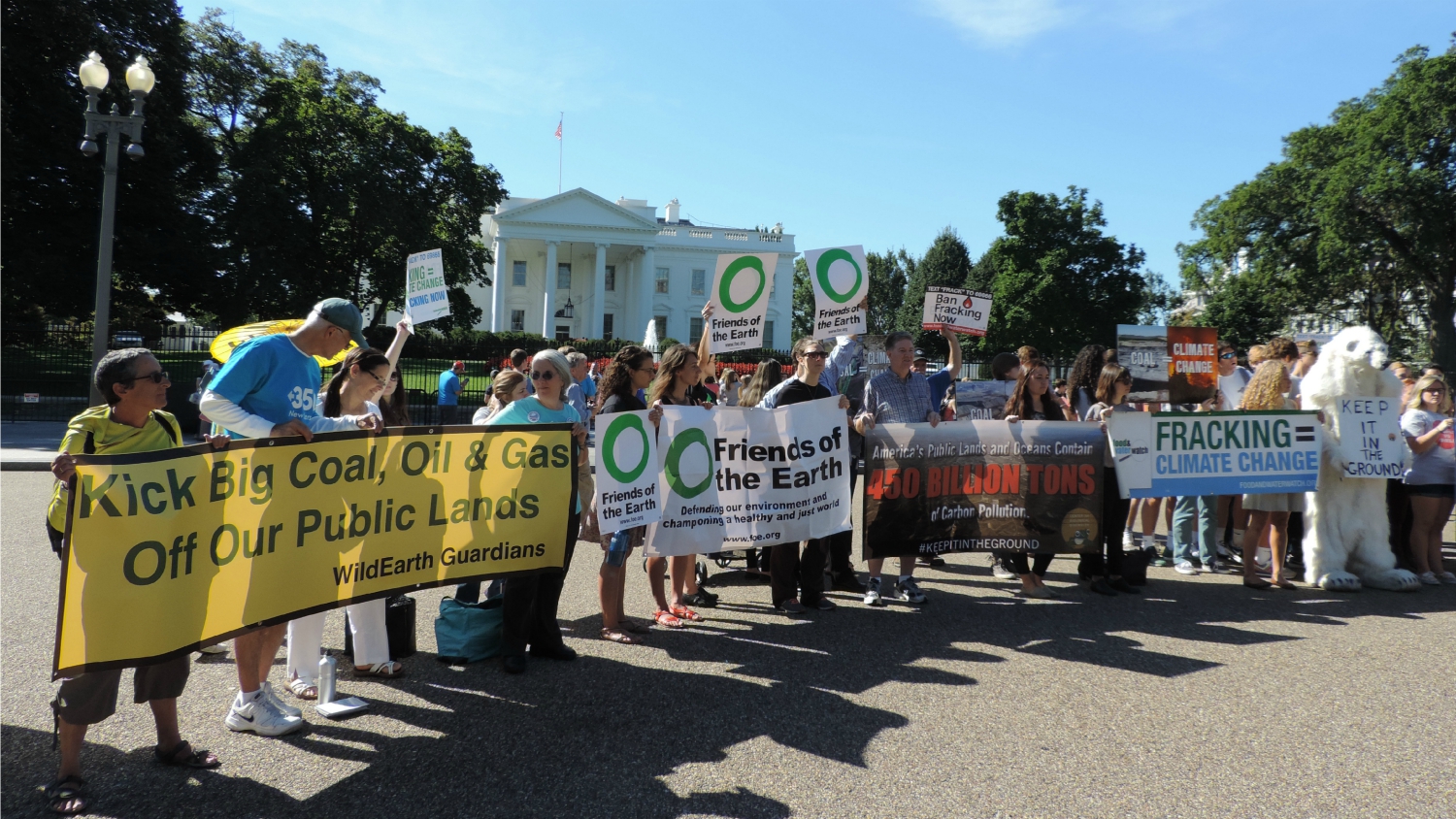 activists and banners in front of White House