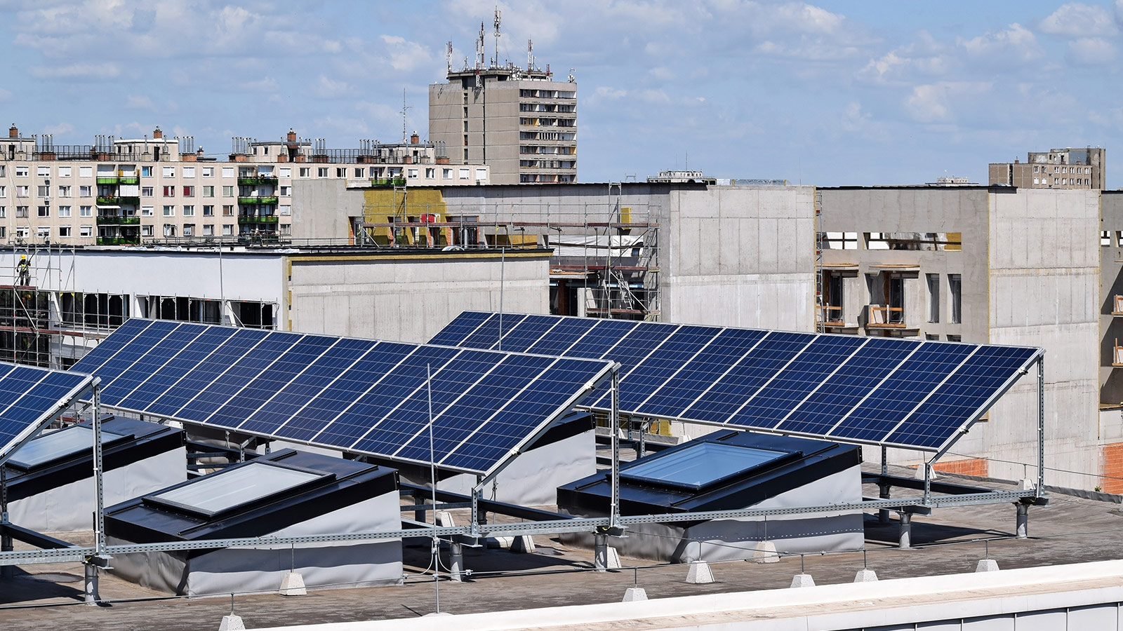 Solar panels on the rooftop of a multifamily building