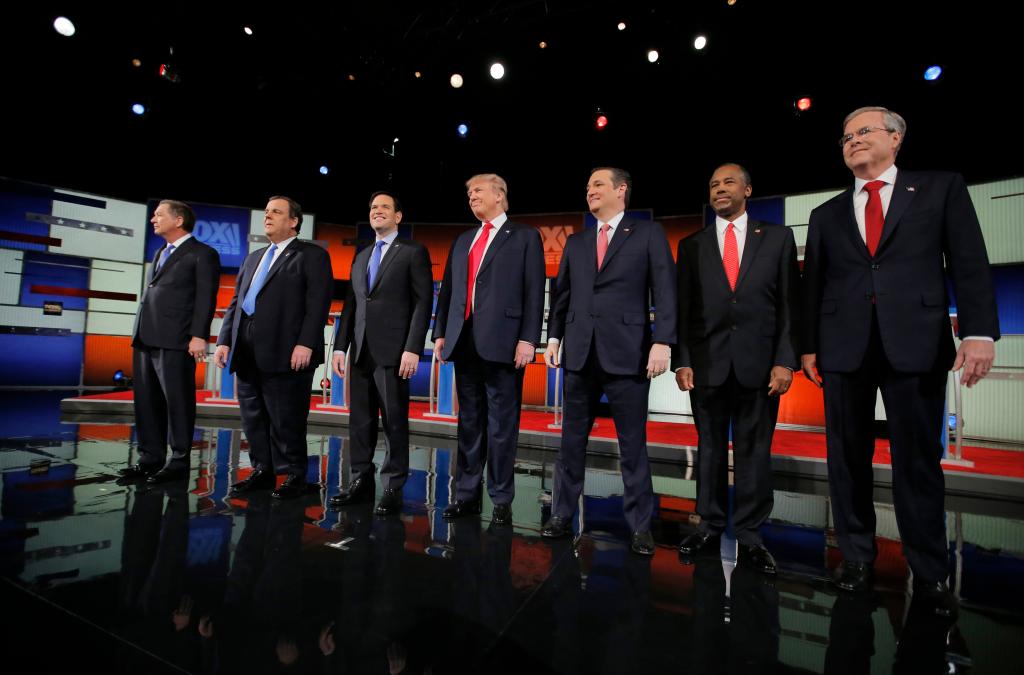 Republican U.S. presidential candidates pose together before the start of the Fox Business Network Republican presidential candidates debate in North Charleston