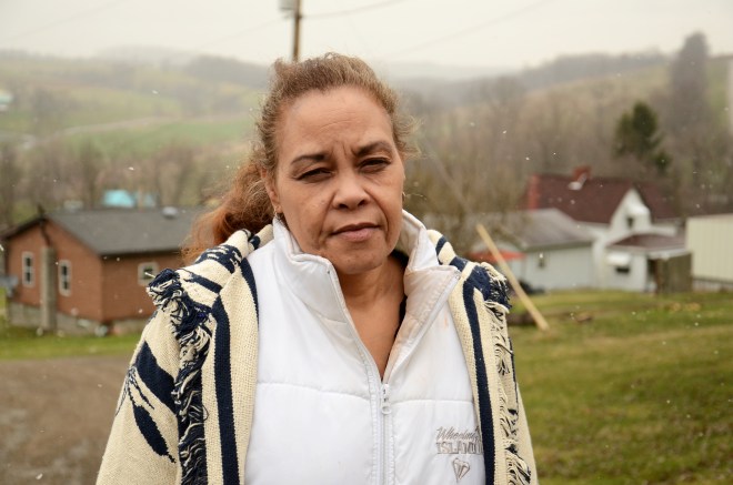 Jeannie Moten lives down the street from the Eakins. She has no running water at her home and receives drinking-water donations, as do several of her neighbors.