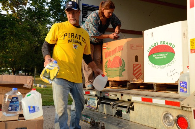 North of Pittsburgh, volunteers prepare for a weekly water drive serving residents of Connoquenessing Township.