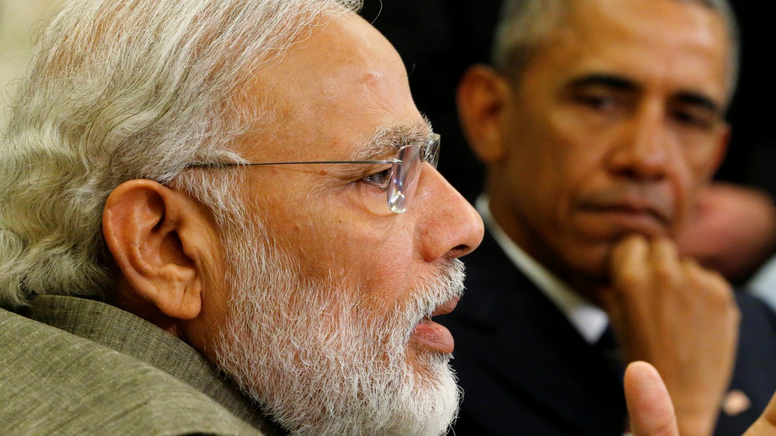 India's Prime Minister Narendra Modi (L) delivers remarks to reporters after meeting with U.S. President Barack Obama (R) in the Oval Office at the White House in Washington, U.S. June 7, 2016.