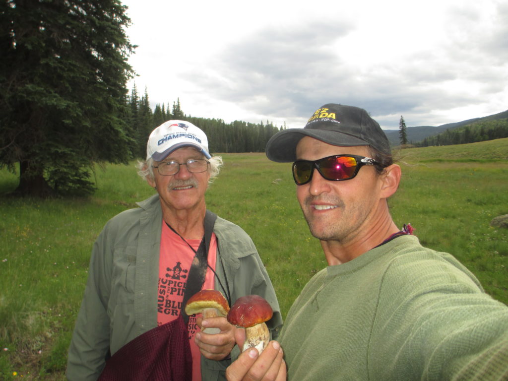 Keith Davis and his father, John, shown in Arizona’s White Mountains, traveled around the globe together. “Me and him talked about everything. We were best buds,” John Davis said.