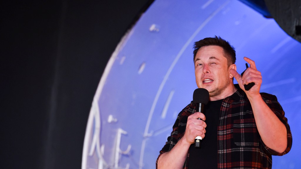 Elon Musk, co-founder and Chief Executive Officer of Tesla Inc., speaks at an unveiling event for The Boring Company Hawthorne test tunnel December 18, 2018 in Hawthorne, California.