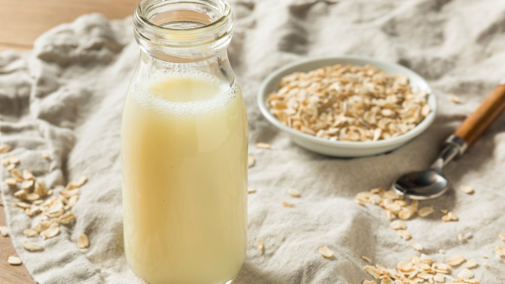 Organic White Oat Milk in a Glass