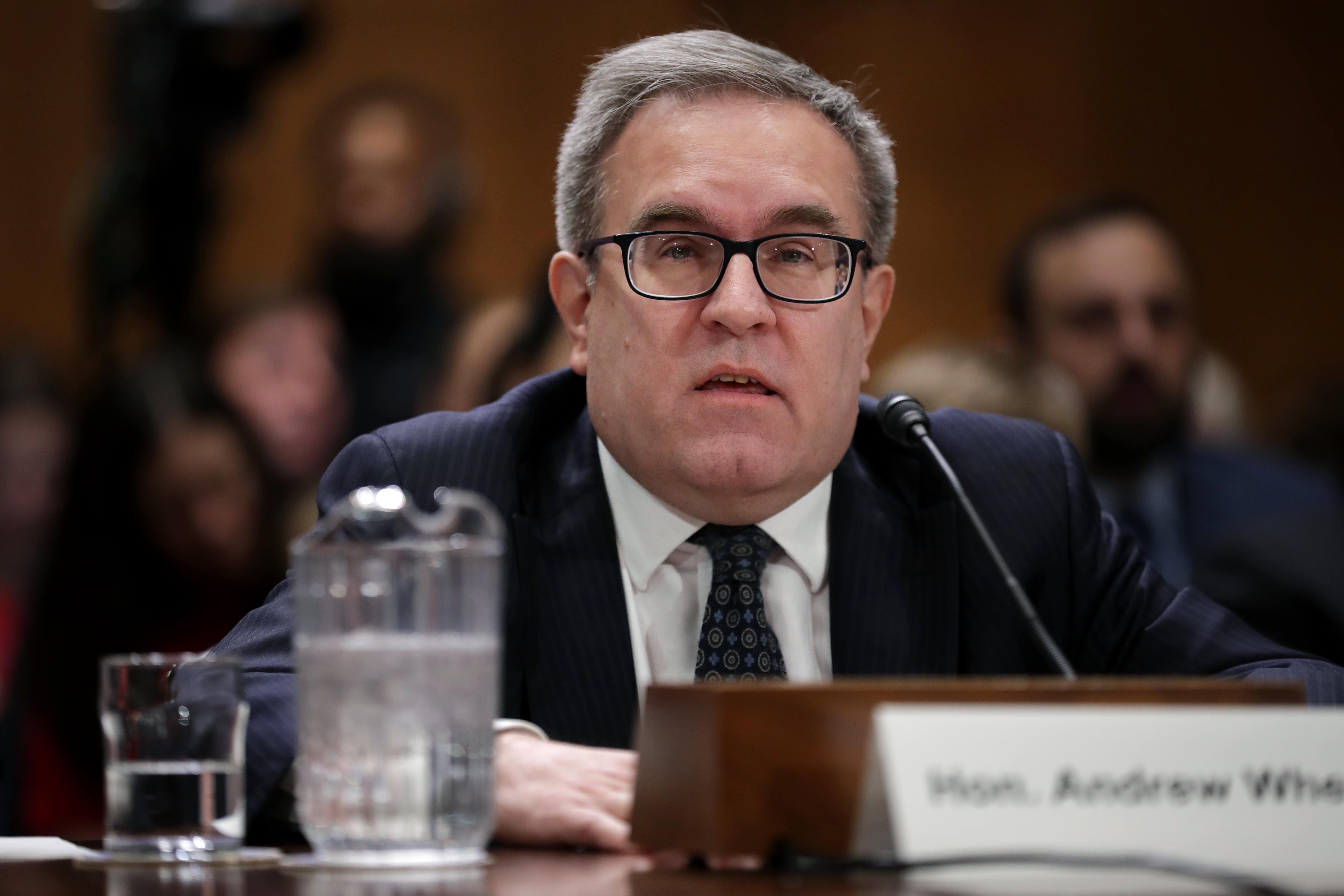 Andrew Wheeler answers senators' questions during his confirmation hearing to be the next administrator of the Environmental Protection Agency