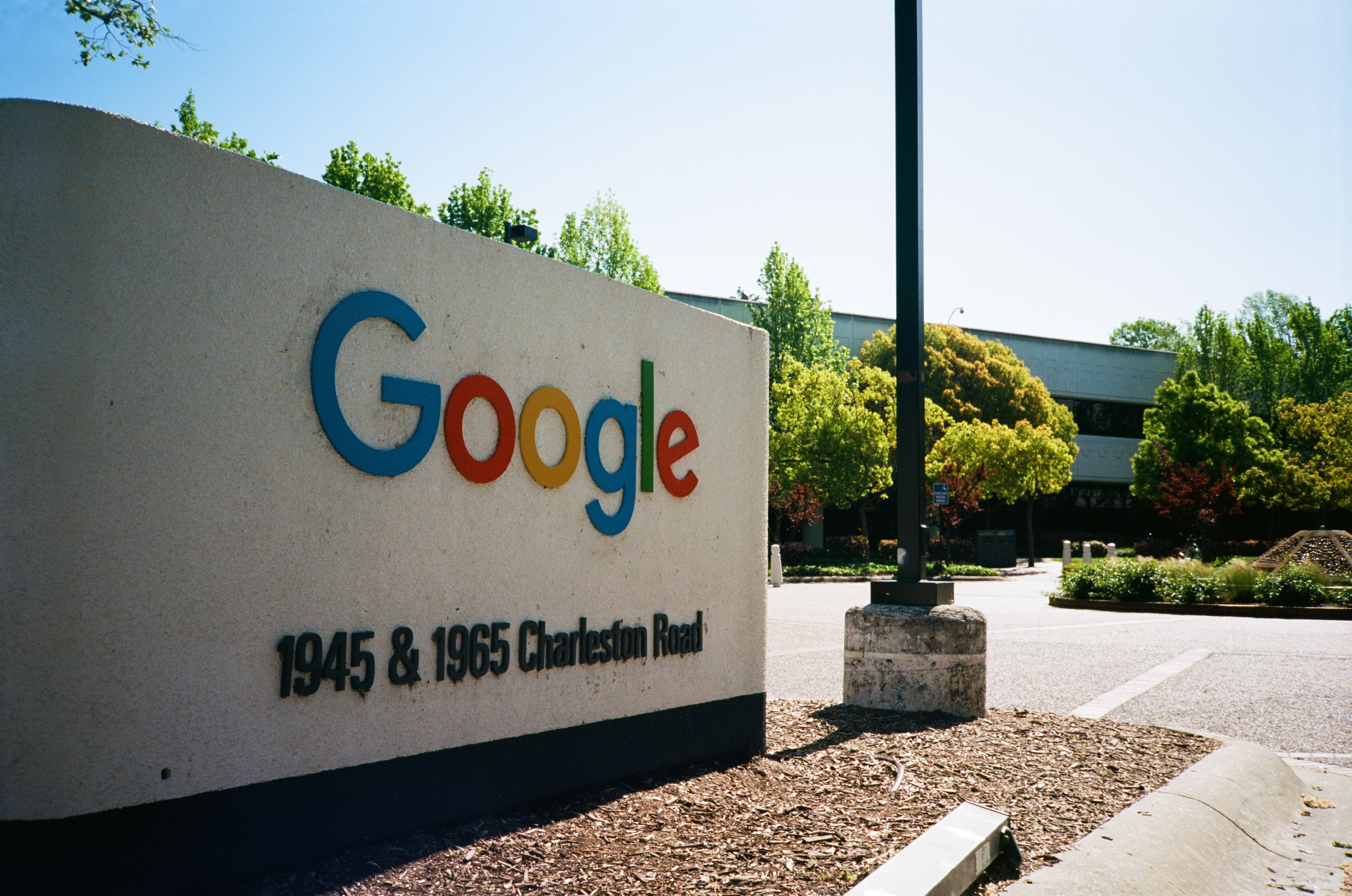Sign and logo at the Googleplex, Google's Silicon Valley headquarters.