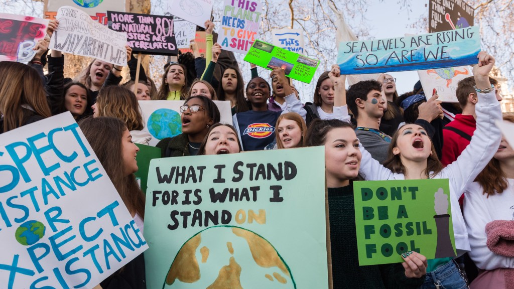 Thousands of youth strikers gather in Parliament Square in central London to protest the government's lack of action on climate change.