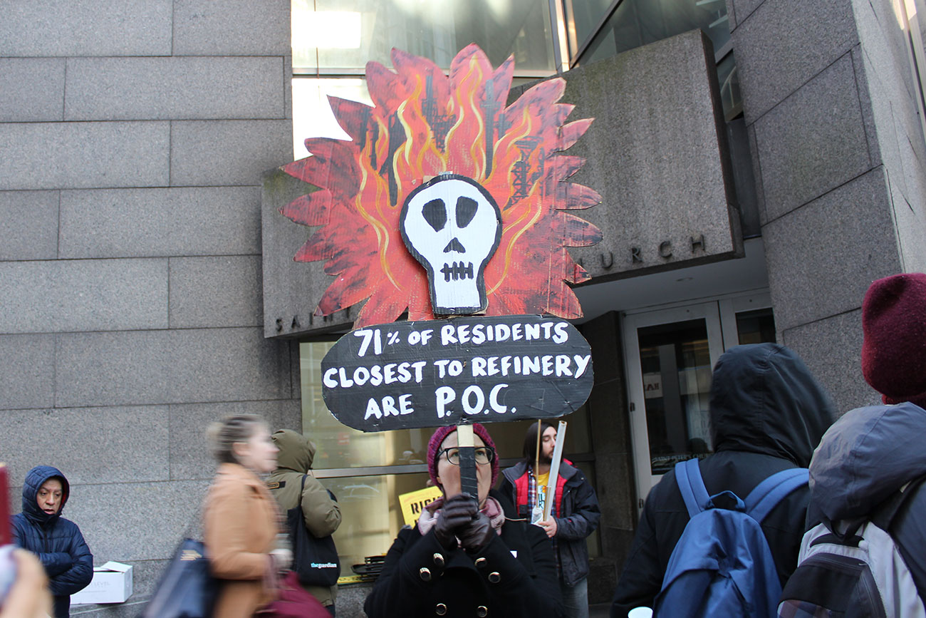 Climate activists gather in the streets of New York City to protest the closed-door auction to sell PES land.