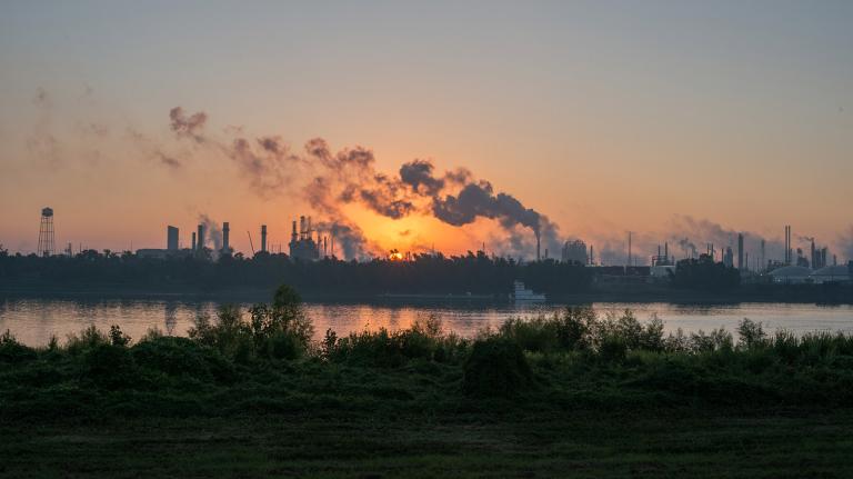 Smoke billows from one of many chemical plants in the area of Cancer Alley in Baton Rouge, Louisiana