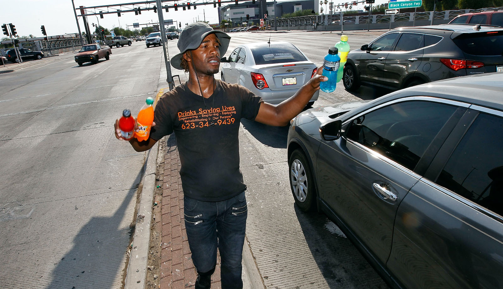Eric Maurice Clark sells cold bottled drinks to motorist