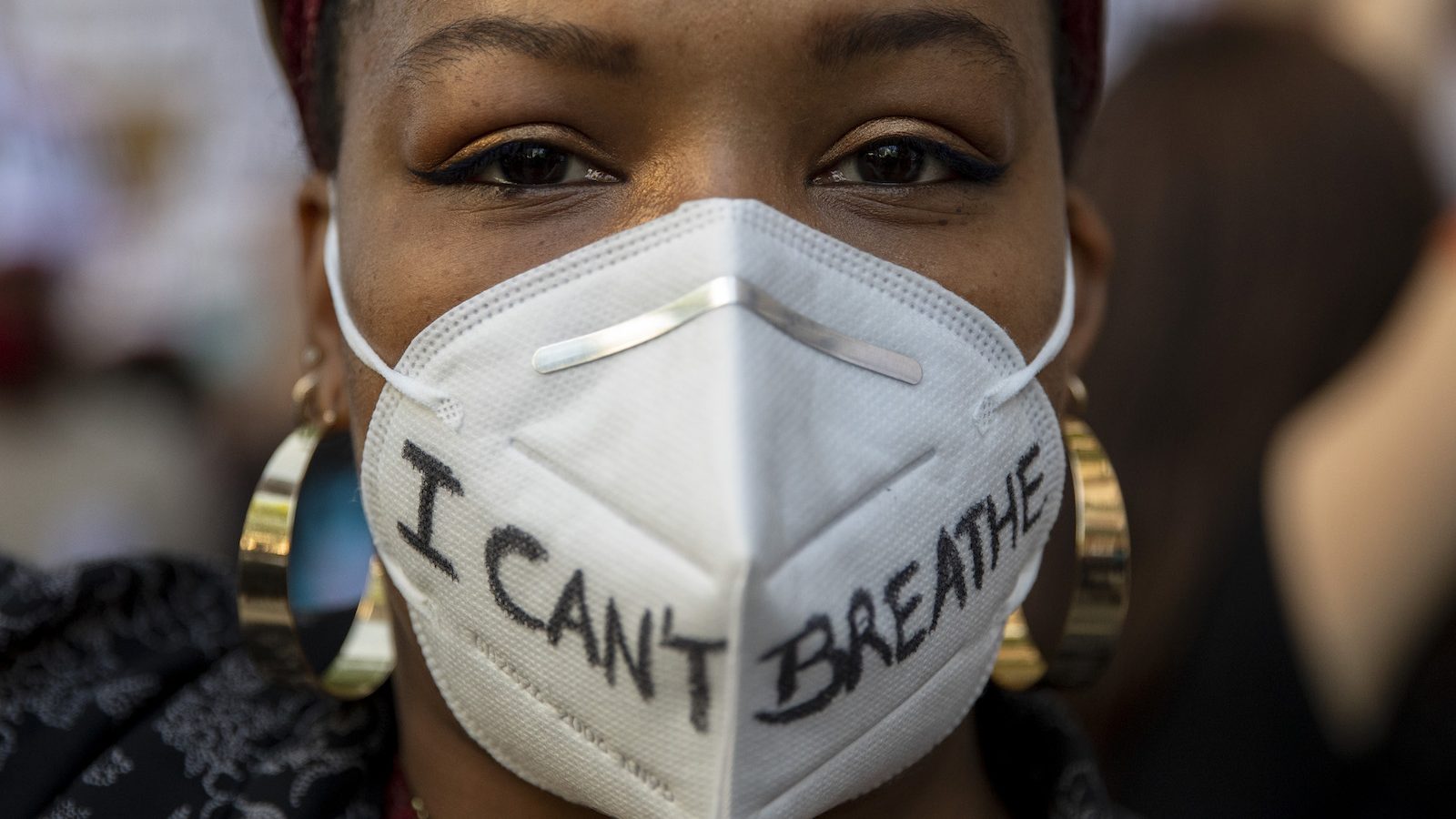 photo of protester in mask that reads I cant breathe