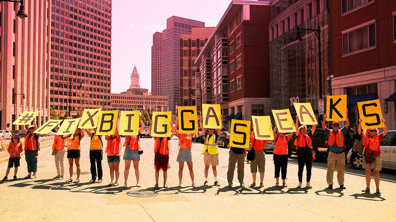photo of protesters in Boston holding sign that says #FixBigGasLeaks