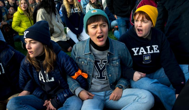Harvard and Yale Students Protest for Divestment at Football Game