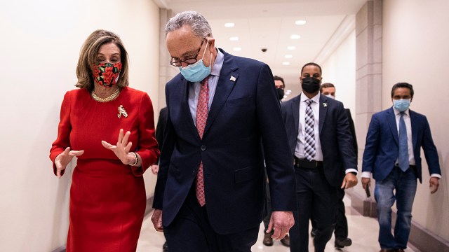 WASHINGTON, DC - DECEMBER 20: Speaker of the House Nancy Pelosi (D-CA) and Senate Minority Leader Chuck Schumer (D-NY) speak after a press conference on Capitol Hill on December 20, 2020 in Washington, DC. Republicans and Democrats in the Senate finally came to an agreement on the coronavirus relief bill and a vote is expected on Monday. (Photo by Tasos Katopodis/Getty Images)