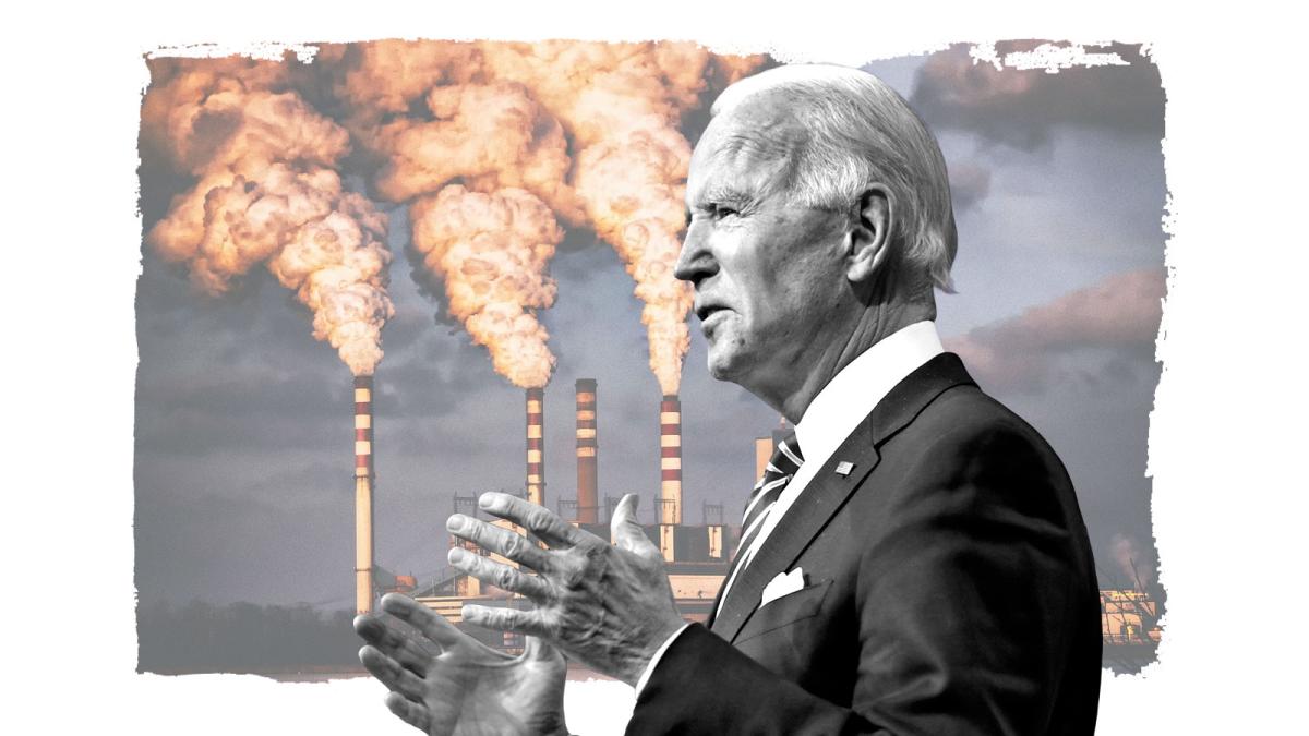 President elect Joe Biden in front of a photograph of power plants