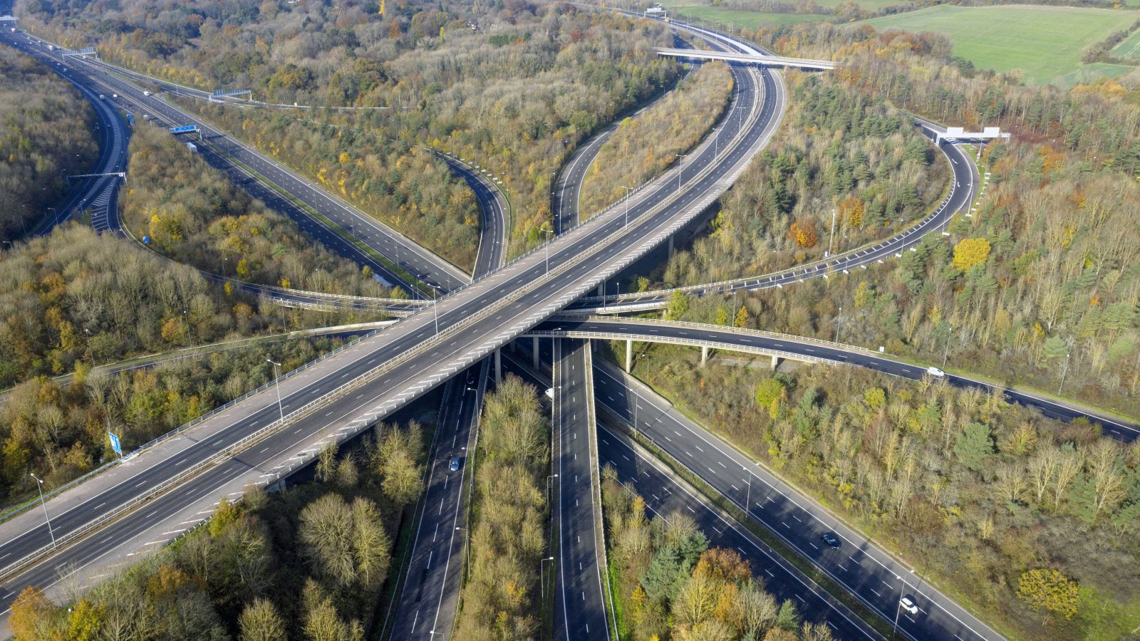 An aerial view of the M25/M23 junction in England, empty of vehicles