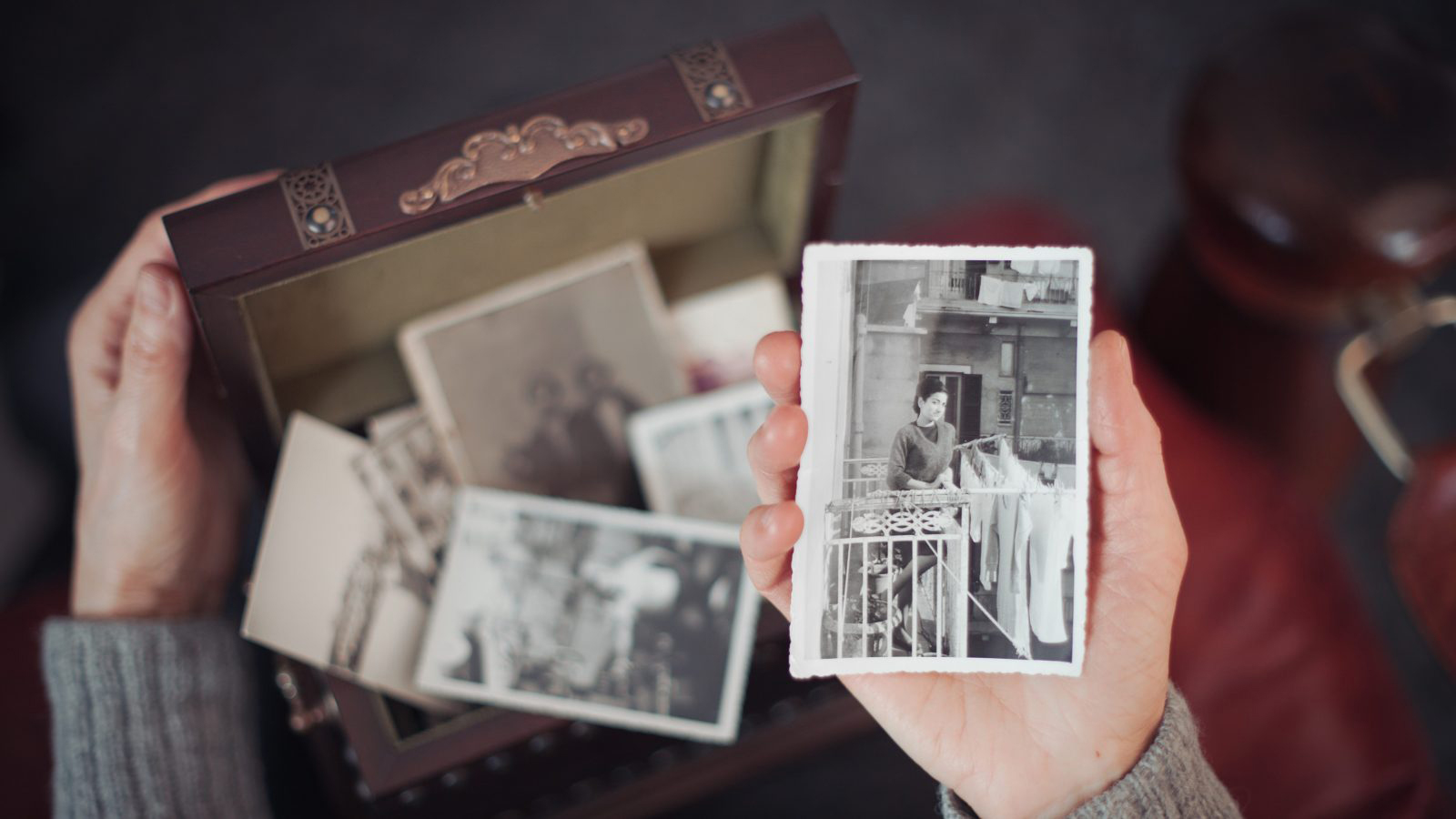 Woman discovering old photographs
