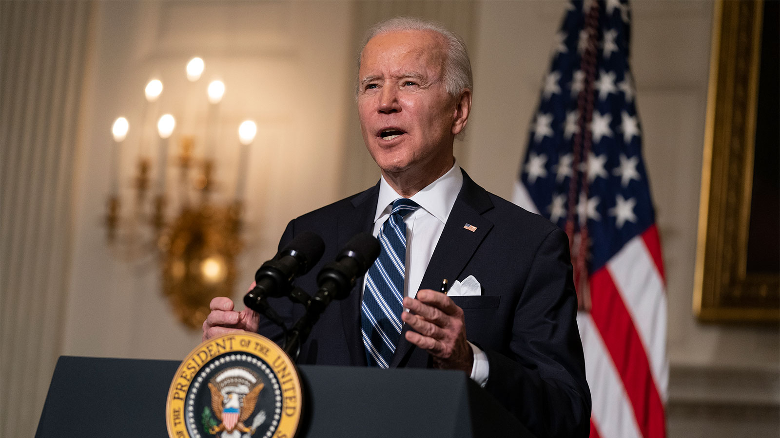 President Joe Biden delivers remarks on climate change and green jobs, in the State Dining Room of the White House