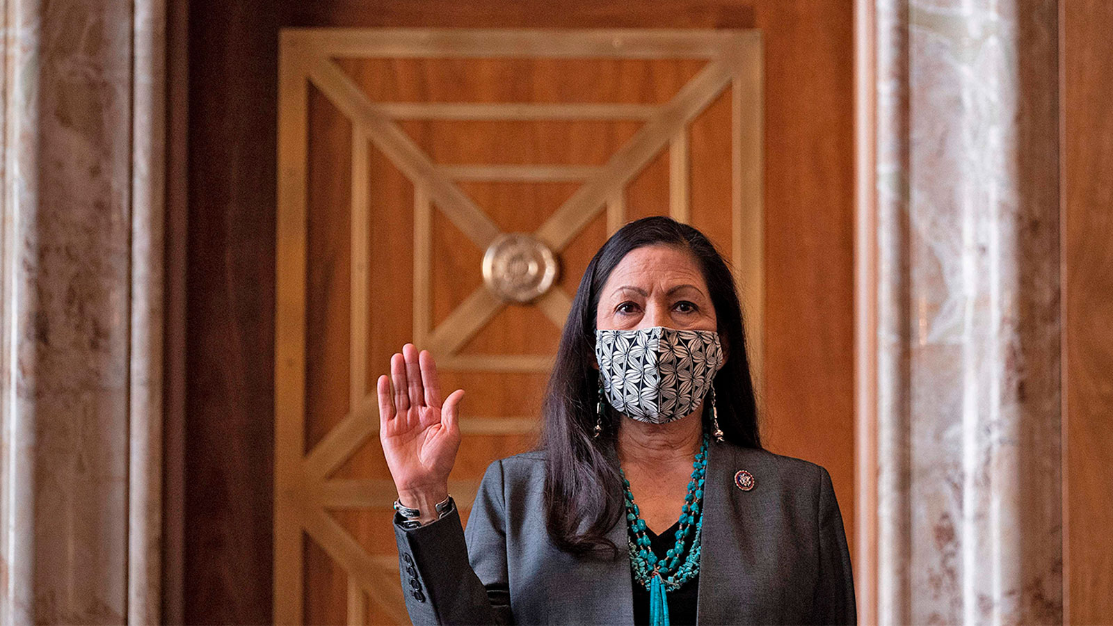 A photograph of Congresswoman Deb Haaland, D-N.M., is sworn in during the Senate Committee on Energy and Natural Resources hearing on her nomination to be Interior Secretary on Capitol Hill in Washington, DC, on February 23, 2021.