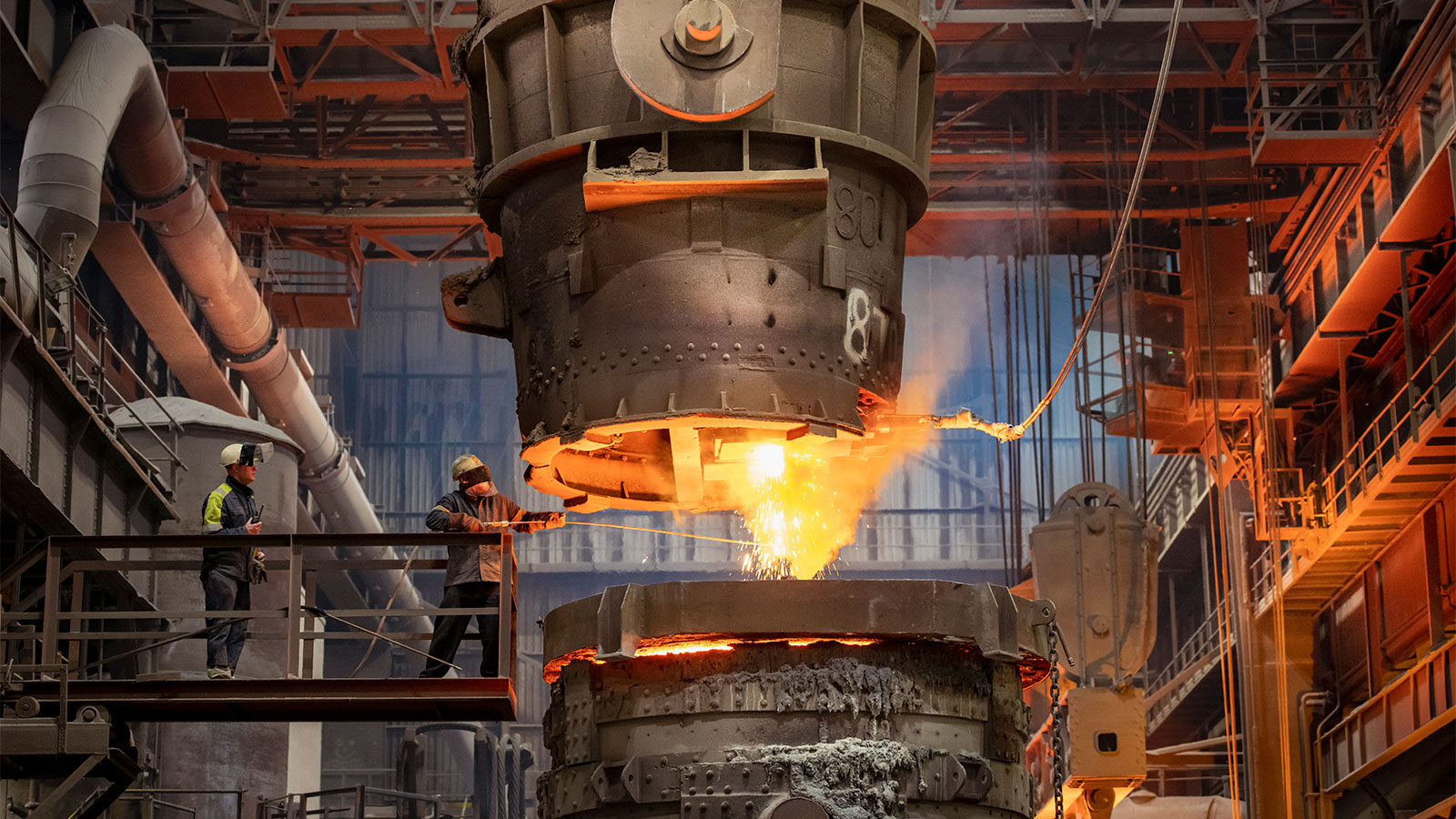 pouring molten steel in a steelworks